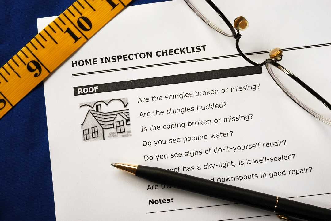real-estate-inspection-report Home inspection checklist on paper